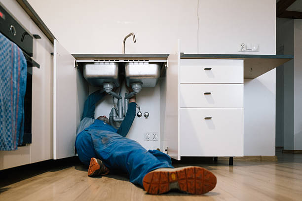 Professional Drain Cleaning technician working in Clinton, TN